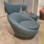 Dusty Blue Leather Lounge Chair with Elevated Headrest and High-Gloss Dark Back Panel